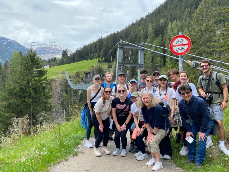 A group of CEE students and faculty visited bridges throughout Europe. They are pictured here in front of Wiesner Viaduct near Davos in Switzerland